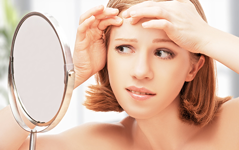 Woman Frightened Saw in the Mirror Acne, Acne Treatment in FL