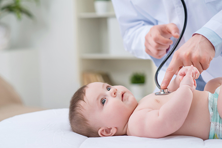 Professional Pediatrician Examining Infant, Pediatric Dermatologist Near Jupiter